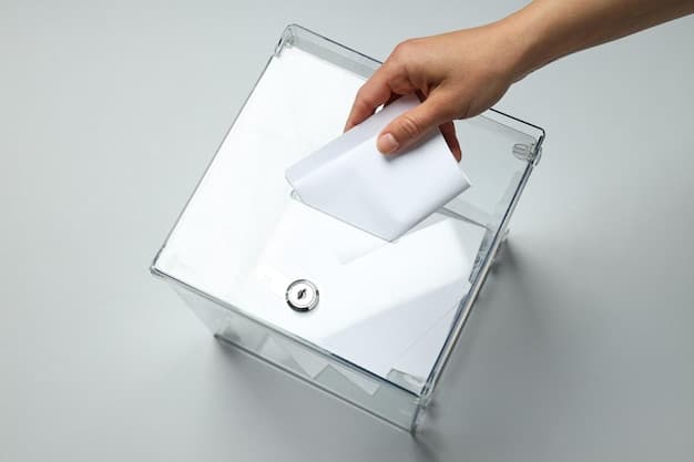 A close-up shot of a hand placing a ballot into a ballot box. The hand is representative of a minority group, and the ballot box is adorned with an American flag sticker. The lighting is soft and emphasizes the solemnity of the act of voting.