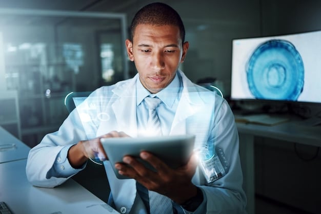 A person looking intently at a digital screen, symbolizing the impact of digitalization on claims processing and accessing information.