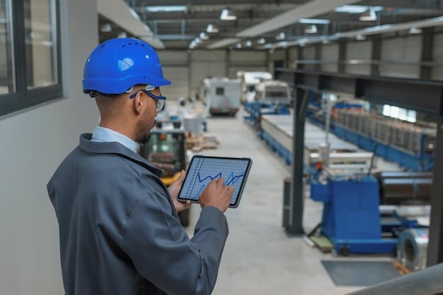A factory worker reviewing a digital tablet with data visualizations showing an upward trend, suggesting optimism for recovery or future growth. The background is a blurred factory setting.